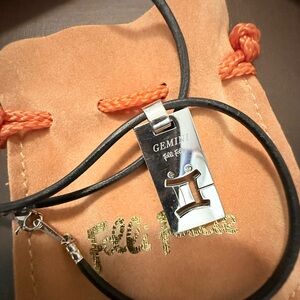 Folli Follie Silver Gimini Signed Pendant Necklace with Black Cord